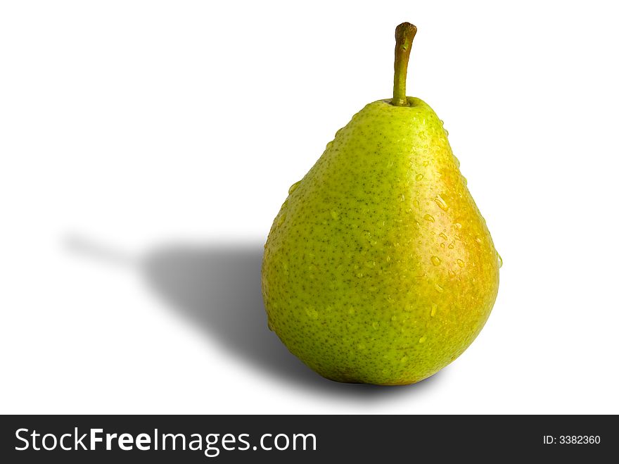 Ripe green pear with water drops isolated on the white background with shadow