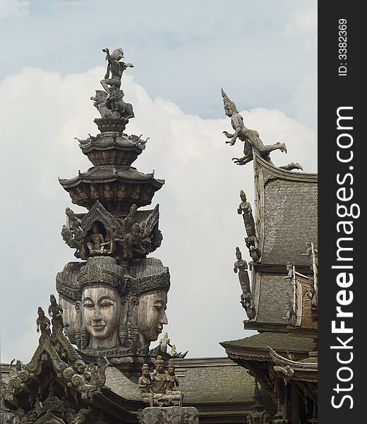 Detail of wooden, Asian temple in Pattaya, Thailand, catering for several Asian religions and philosophies.