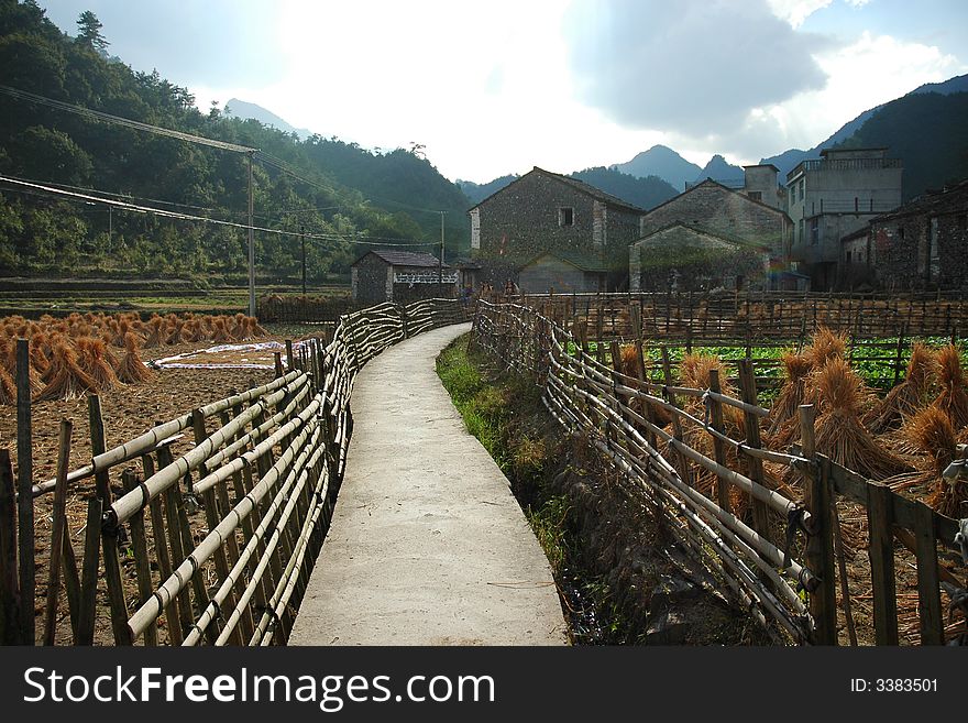 When i pass a traditional chinese country.i find this road is beautiful under the afternoon sun-light. When i pass a traditional chinese country.i find this road is beautiful under the afternoon sun-light.