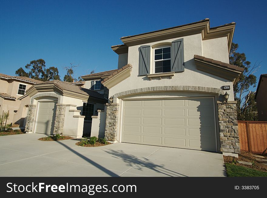 A newly constructed, modern american home. A newly constructed, modern american home.