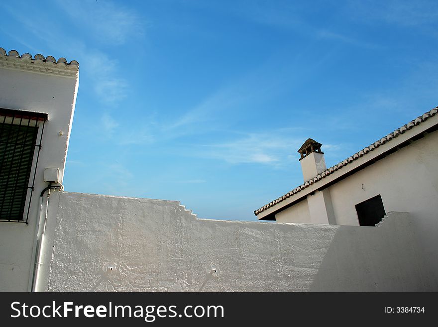 Mediterranean scene with white walls and roofs of Granada in Andalusia. Mediterranean scene with white walls and roofs of Granada in Andalusia