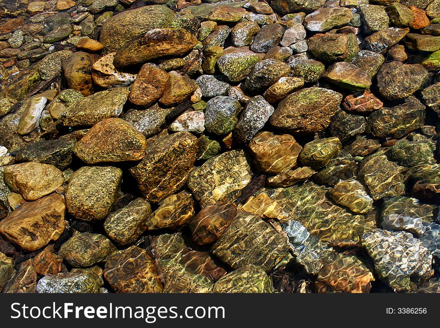 Stones in transparent river water. Stones in transparent river water