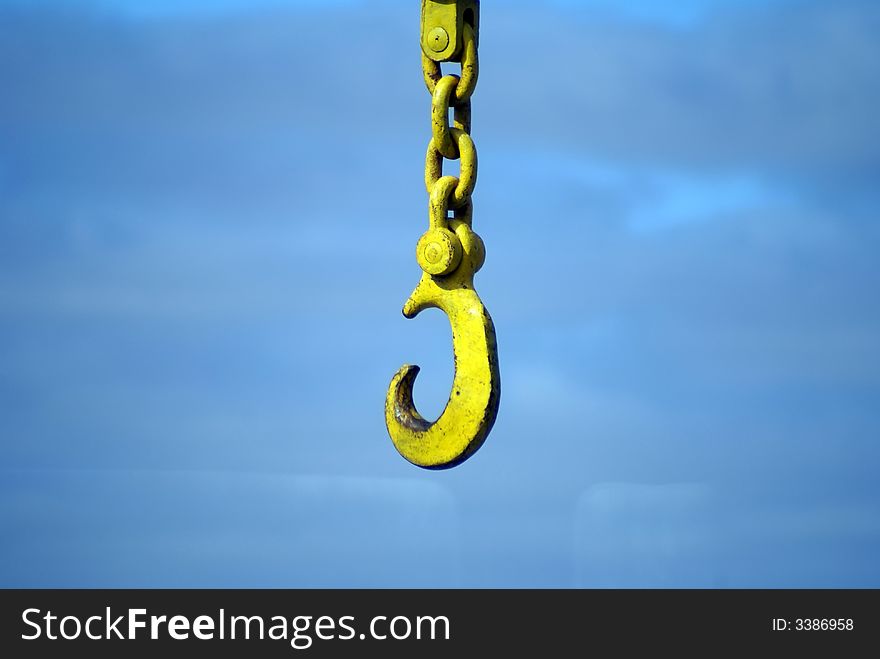 Big yellow hook of a port crane