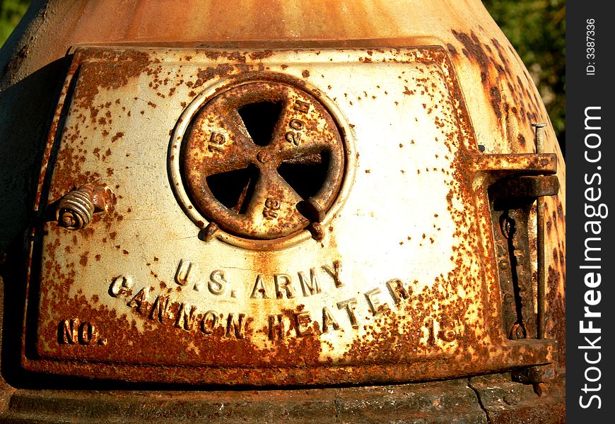 A shot of a old rusty Cannon heater.