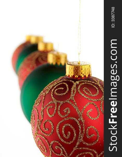 Red and green Christmas decorations isolated on white background