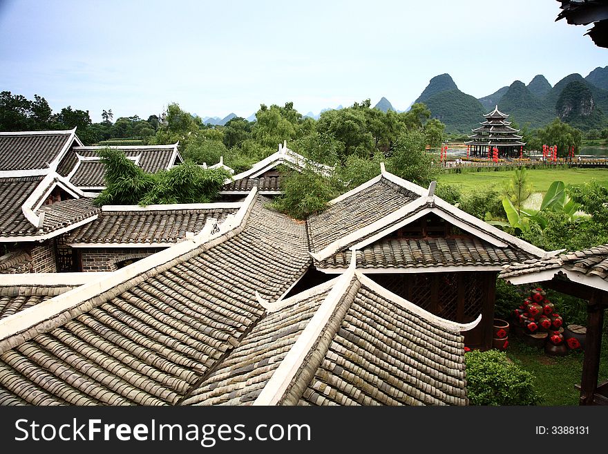 Tree rurality gree blue sky frame house  aisle  minority yangshuo guilin china chinese. Tree rurality gree blue sky frame house  aisle  minority yangshuo guilin china chinese