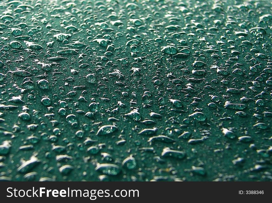 Close-up umbrella with  water drops. Close-up umbrella with  water drops