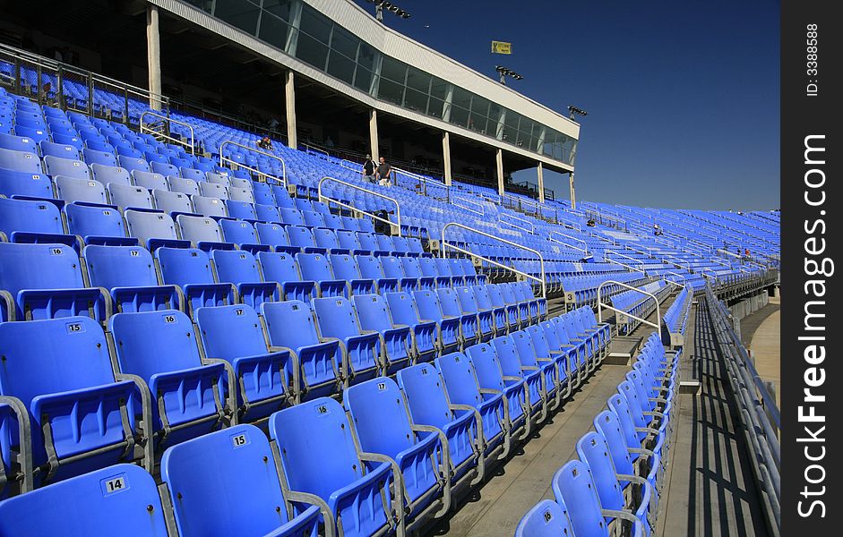 A front row view from turn#4 looking up at the luxury boxes at Lowes Motor Speedway in Concord, NC. A front row view from turn#4 looking up at the luxury boxes at Lowes Motor Speedway in Concord, NC