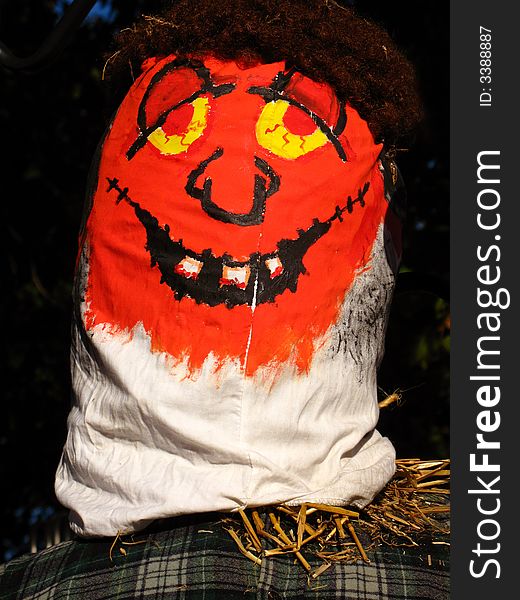 Closeup photo of a halloween scarecrow at a flower shop. Closeup photo of a halloween scarecrow at a flower shop.