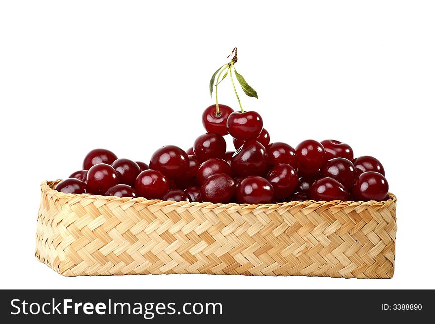 Cherry relations -  cherries in basket isolated on white