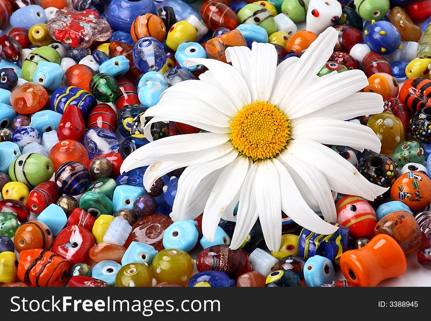 Colorful beads and daisy