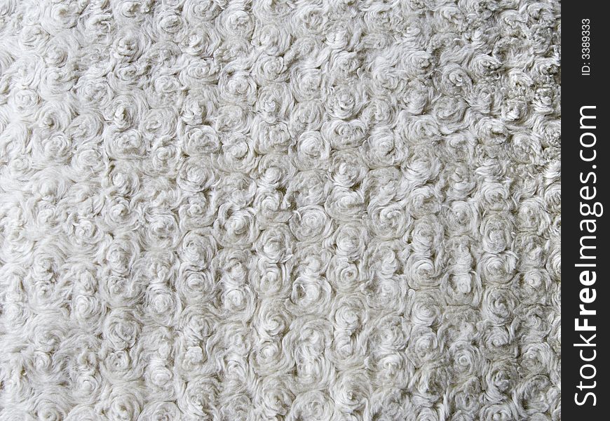 Medium shot photo of curly wool texture. Medium shot photo of curly wool texture