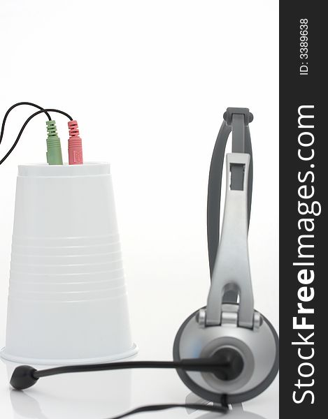 A computer headset over a white background