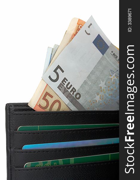 A few euro notes inside a wallet. A few euro notes inside a wallet