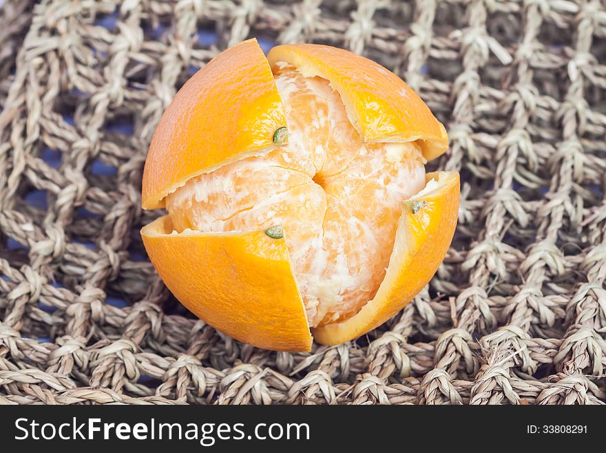 Peelling shell orange on weaving vine