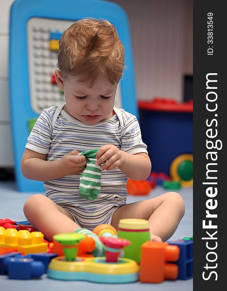 A Baby Boy Crying In Children Room