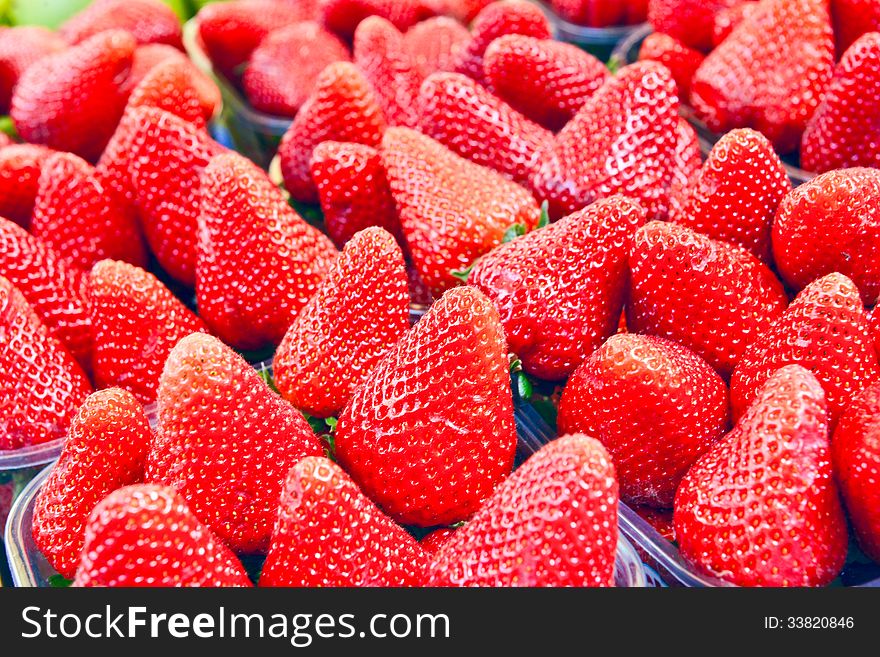 Strawberries in a box on the counter