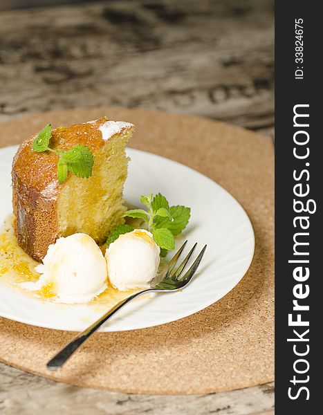 A cake made ​​of maize flour on plate, blurred background