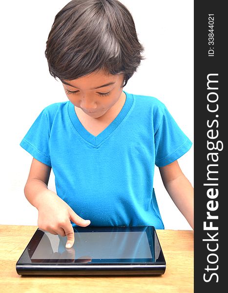 Little Boy Using Tablet