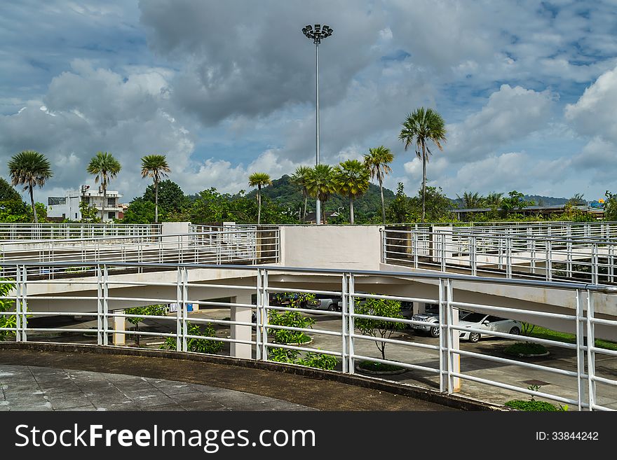 Parking Lot with cloudy blue sky