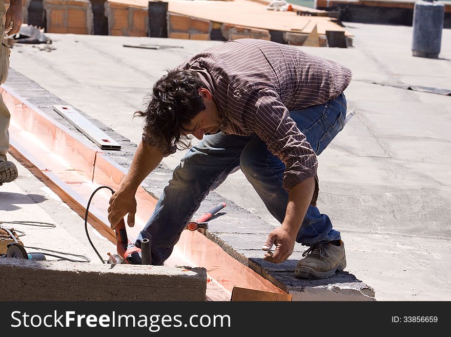 Building worker at work in a site building