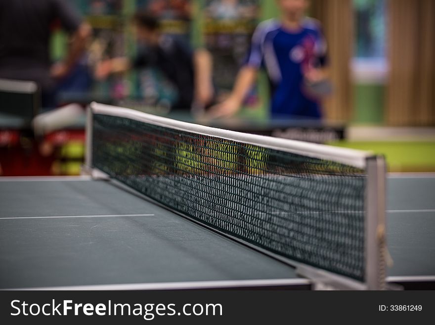 Net in table tennis in the hall. Net in table tennis in the hall.