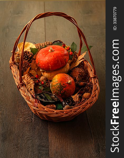 Fall decoration on wooden background. Selective focus. Fall decoration on wooden background. Selective focus.