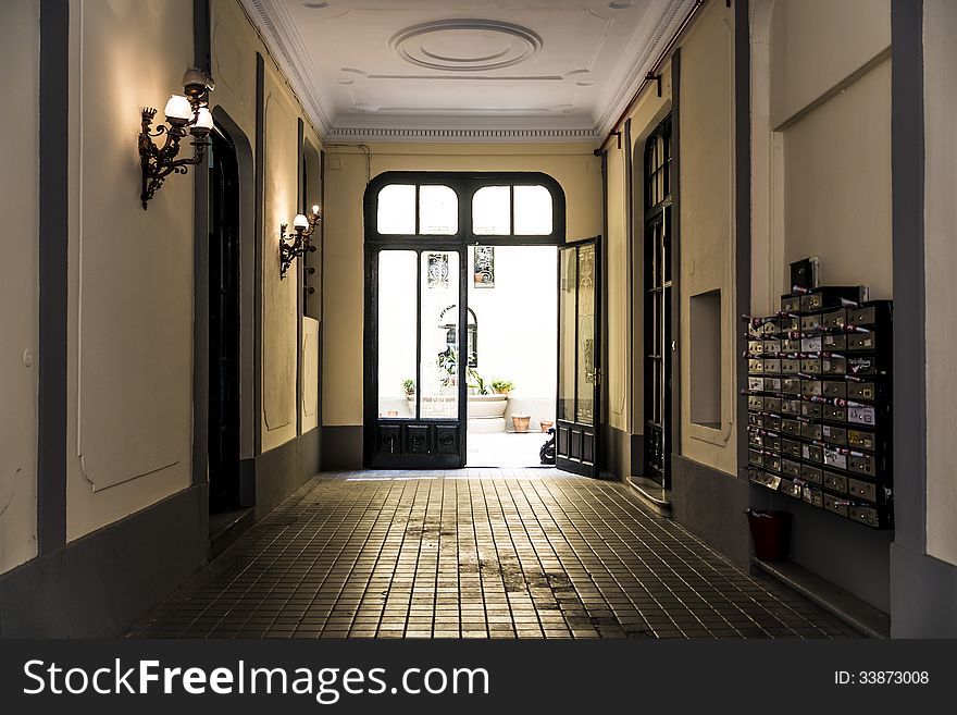 A beautiful door opens the way for an interior court.