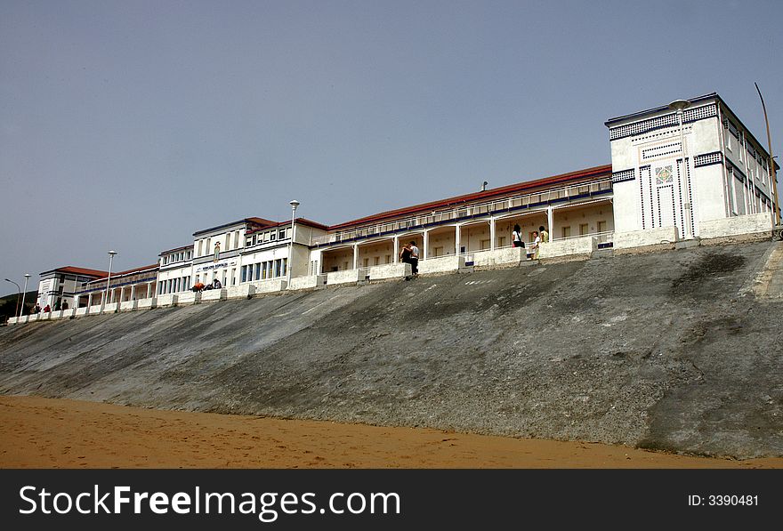 A spa house with a promenade on the seaside. A spa house with a promenade on the seaside