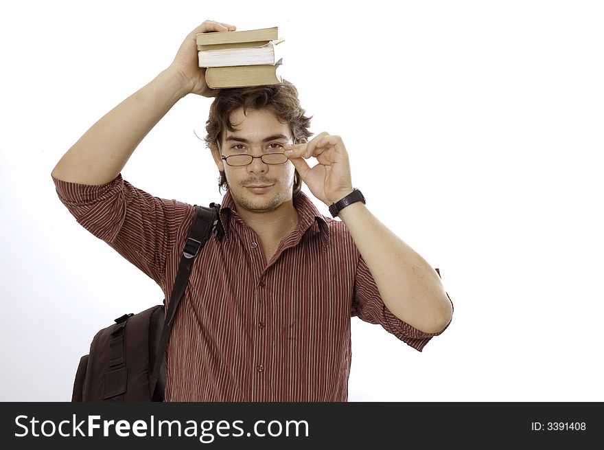 Portrait of a male student holding books and reading glasses - isolated over white background. Portrait of a male student holding books and reading glasses - isolated over white background