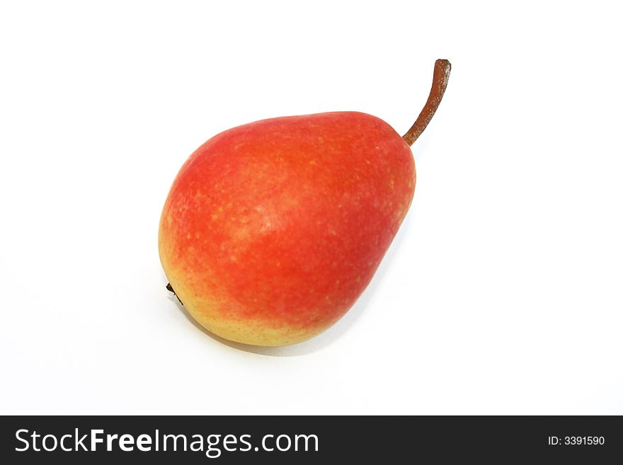 A red pear isolated on white background. A red pear isolated on white background.