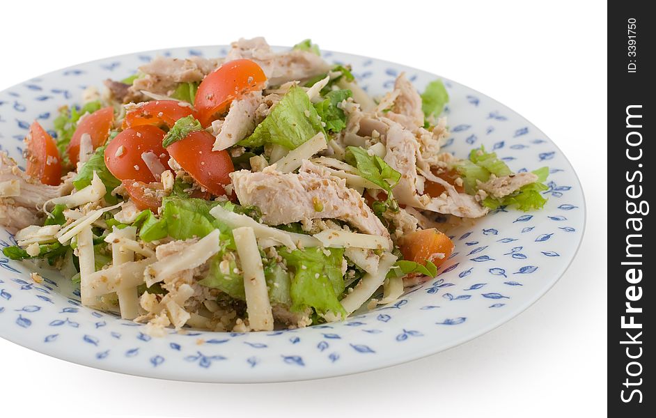 Salad in plate, isolated white