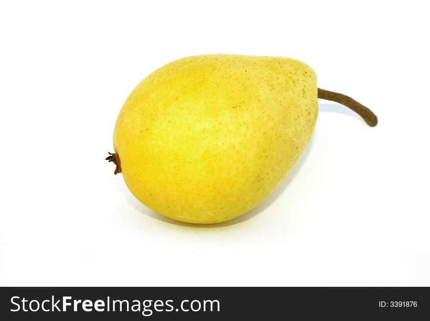 A yellow pear isolated on white background. A yellow pear isolated on white background.