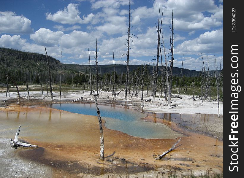 Opalescent Pool is located in Upper Geyser Basin in Yellowstone National Park