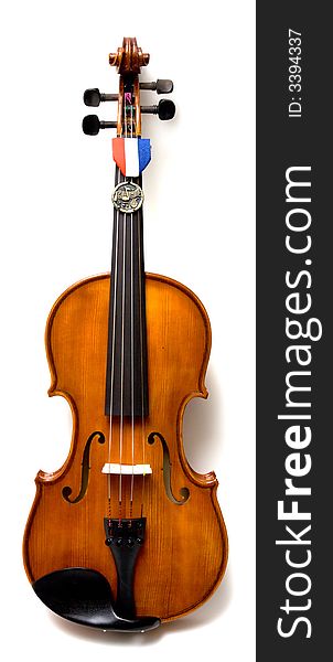 A music medal on a violin for student musicians and instrumental programs. A music medal on a violin for student musicians and instrumental programs.