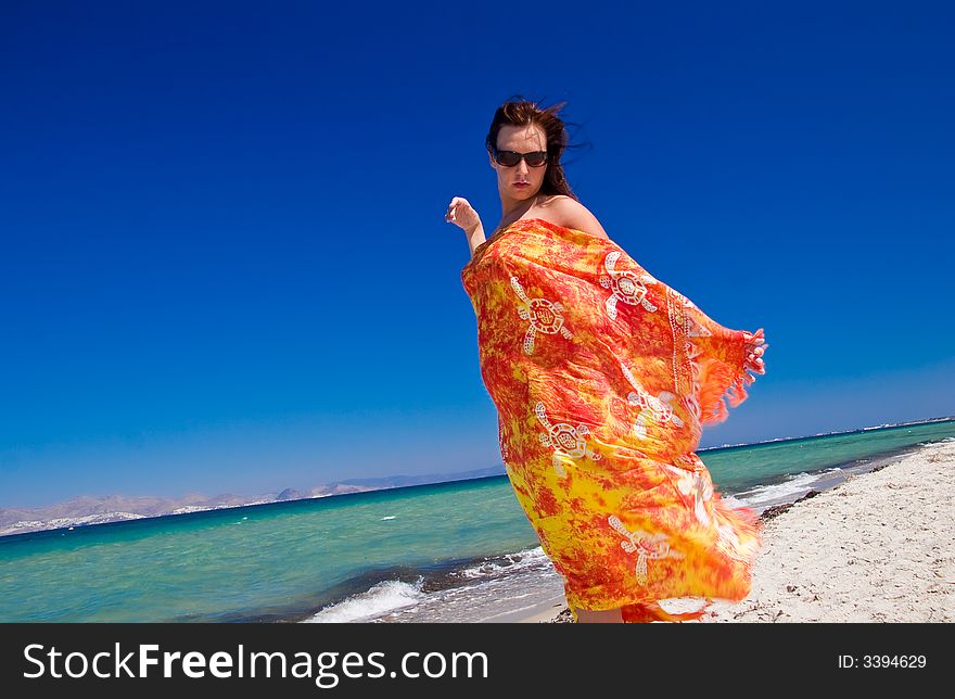 Women In Pareo On The Beach