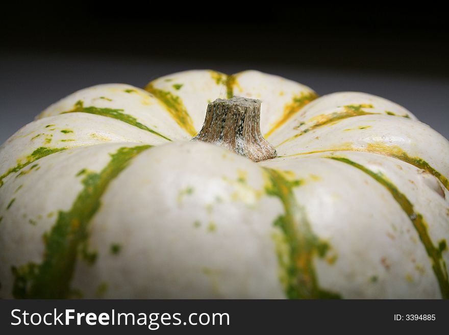 A creepy pumpkin with interesting warts and creases. A creepy pumpkin with interesting warts and creases