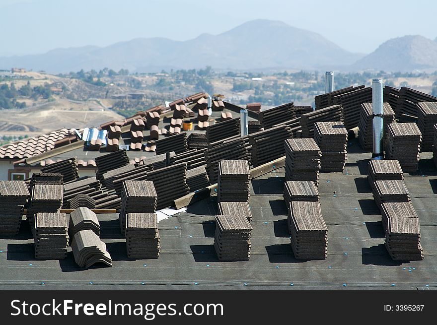 New Home Construction Site Image of Roof and Tiles. New Home Construction Site Image of Roof and Tiles