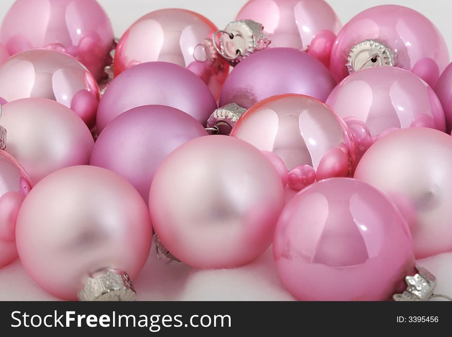 Bunch of pink christmas baubles , side view. Bunch of pink christmas baubles , side view