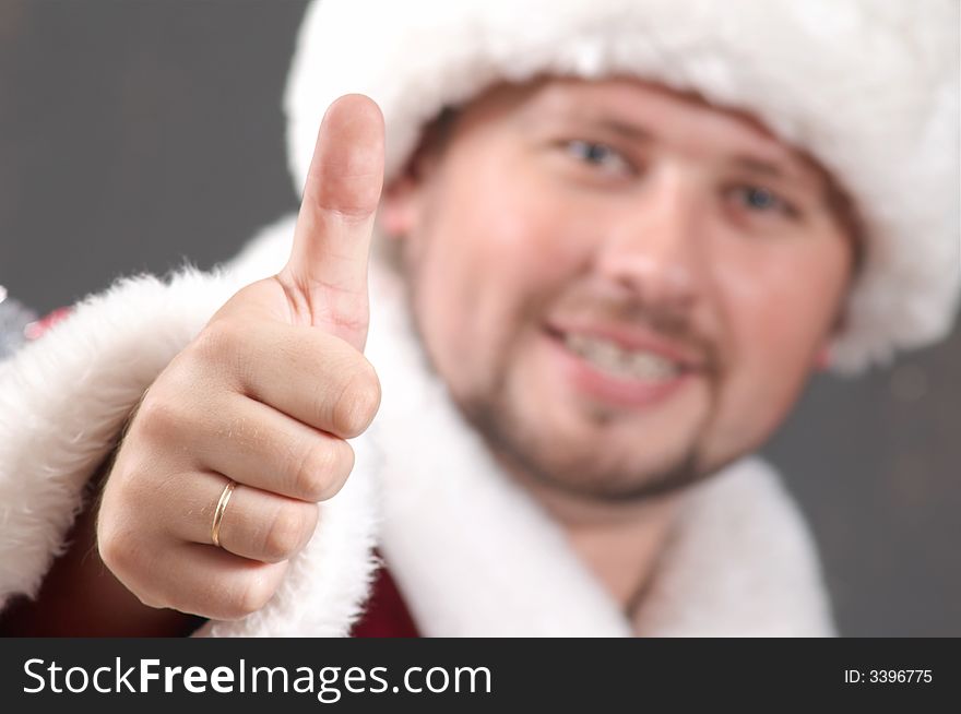 Santa Claus showing his thumb. Santa Claus showing his thumb