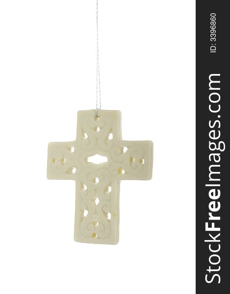An image of a white cross Christmas ornament. An image of a white cross Christmas ornament