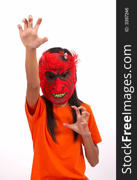 A girl wearing a scary mask over a white background