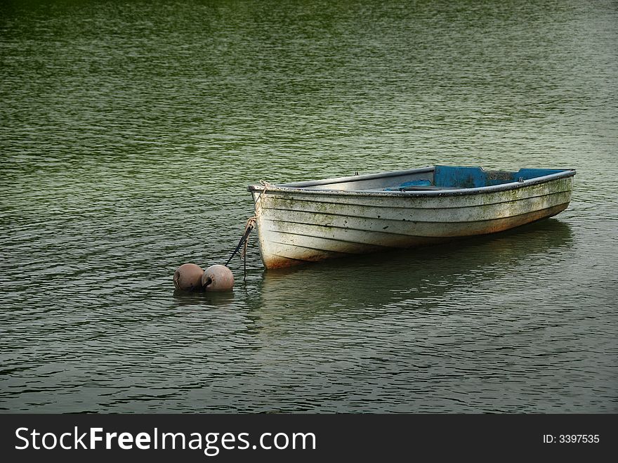 Boat and floats in the reservoirs. Boat and floats in the reservoirs