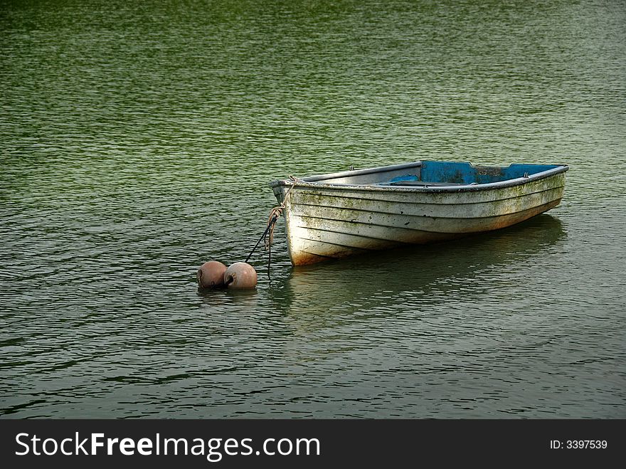 Boat and floats in the reservoirs. Boat and floats in the reservoirs