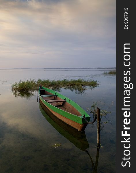 Boat And Lake At Twilight