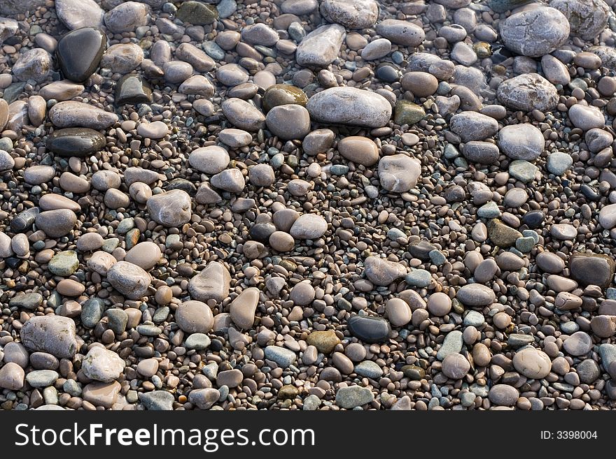 Stone; pebble; water; background; nature;