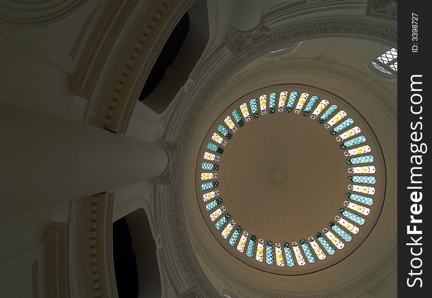 High dome ceiling with stained glass panels and column in the national Museum of Singapore. High dome ceiling with stained glass panels and column in the national Museum of Singapore.
