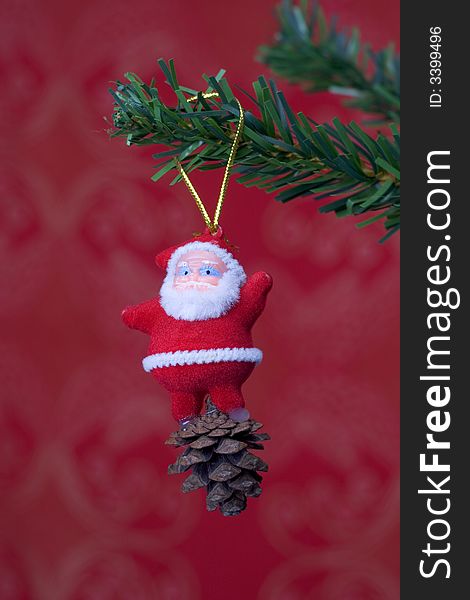Christmas object hanging on fir tree isolated