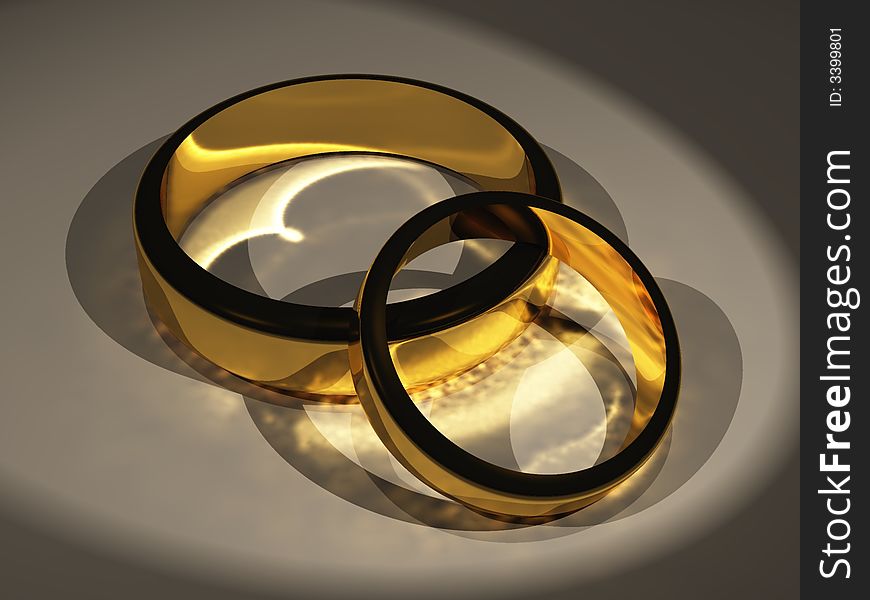 Two Gold Rings on a table top. Two Gold Rings on a table top