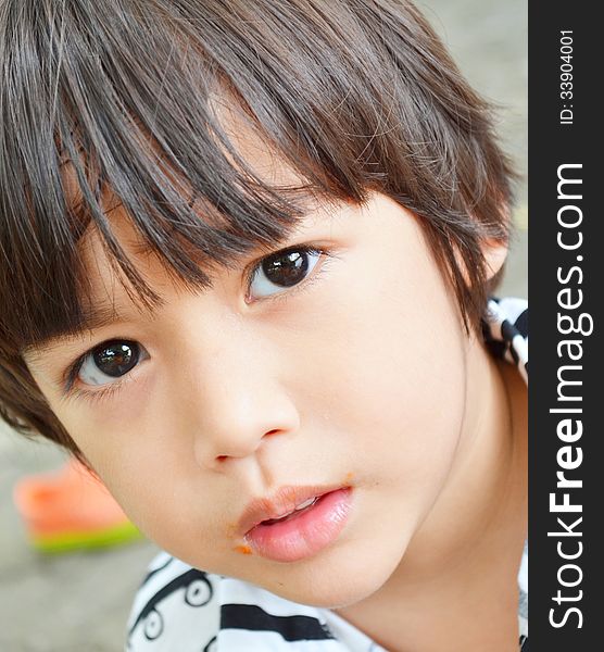 Little boy beautiful eyes portrait close up